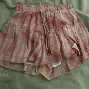 pink Flowey skirt with shirts under from altered state.